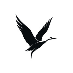 Fototapeta premium Black silhouette of a graceful crane or heron-like bird in flight with wings spread against a white background.