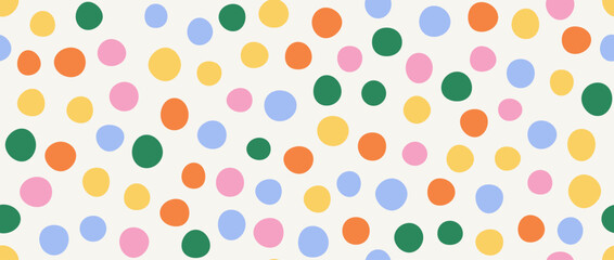 Bright birthday polka dot seamless pattern. Colorful repeated round confetti background. Cute dotted wallpaper for Easter wrapping paper, birthday decoration design, kid nursery decor. Vector