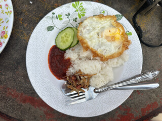 Traditional Malaysian Nasi Lemak with Fried Egg