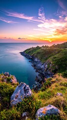 Coastal landscape with a colorful sunset over the ocean
