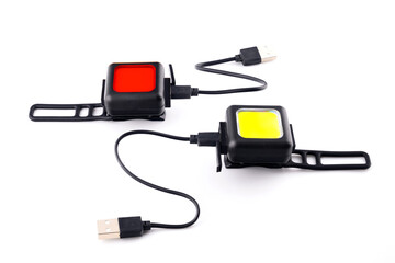 Naklejka premium pair of led bicycle lamps with wires on white background