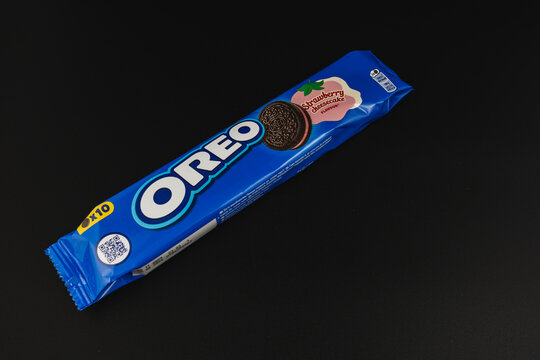 Lviv Ukraine 12.08.2025 Oreo cookie package with strawberry cream flavor on a dark background