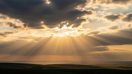 Sun rays breaking through clouds, demonstrating atmospheric scattering and light behavior during changing weather.