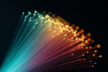AI generated colorful fiber optic strands glowing in gradient hues on a dark background symbolizing high speed data communication modern network technology and digital connectivity