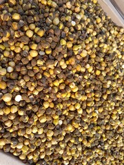 Roasted yellow gram pile show for sale in the market or Cicer Arietinum pile pattern 