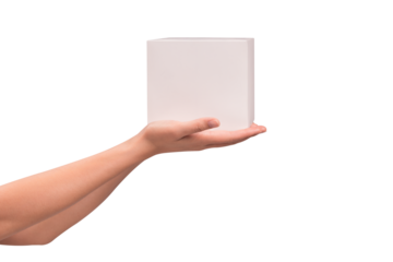 Close-up of hand holding a closed new white package box isolated on a transparent PNG. High quality studio shoot. concept for business, shopping, transportation, technology and advertising.