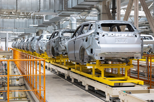 Welding car body. Modern car assembly plant. Auto industry. High-tech factory
