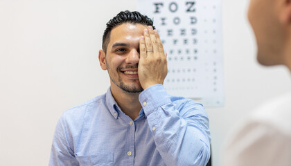 Eye examination of a young man by an ophthalmologist