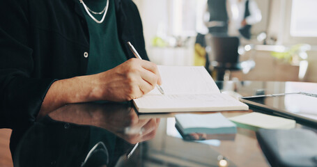 Man, hands or hairdresser writing with book in salon for schedule booking, appointment or checklist. Closeup, male person or beautician checking diary with notes for reminder in beauty parlor or shop