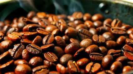 Coffee beans roasting close up dark brown aroma fresh roasted beverage caffeine energy morning drink preparation gourmet arabica robusta flavor ingredient natural food preparation process hot steam