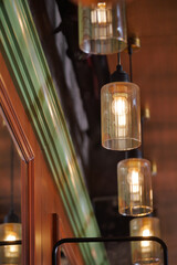 Hanging lights create warm ambiance in cozy space