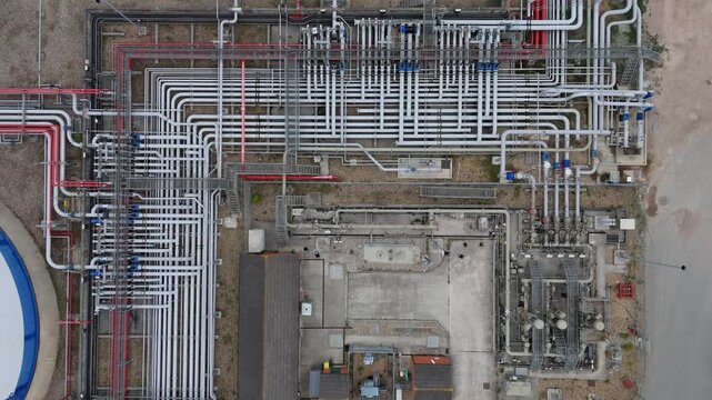 Top down aerial view of gas pipelines, fuel storage for import and export, natural gas supply, Canvey Island UK