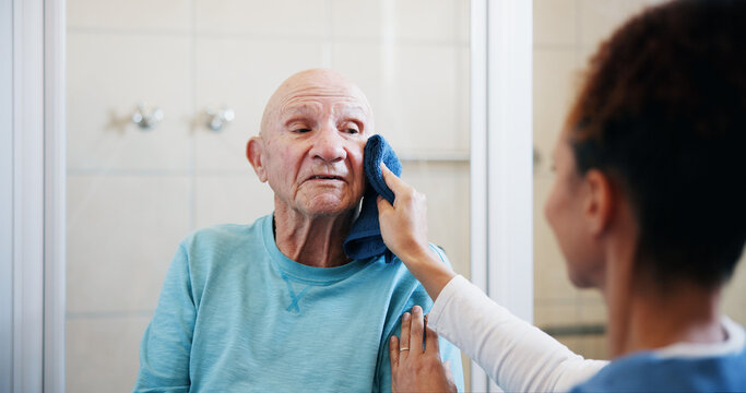 Nurse, help and washing with old man in bathroom for medical support, assisted living and cleaning. Healthcare, caregiver and grooming with people in nursing home for care, hygiene and retirement