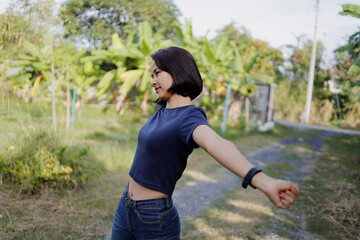 Fototapeta premium Woman stretches before exercising in the morning.