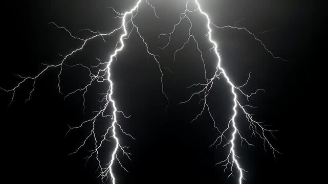 A dramatic display of lightning bolts illuminating the dark night sky with electrical energy