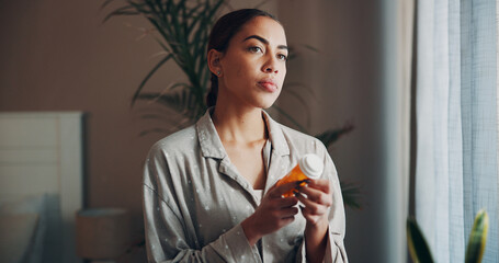 Home, woman and thinking with pills in morning for prescription, health remedy and cure. Apartment,...