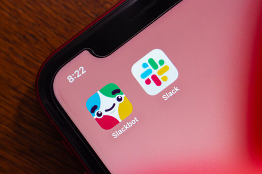 Quito, ECUADOR - Oct 28 2025 : Slack and Slackbot icons are seen in an iPhone.