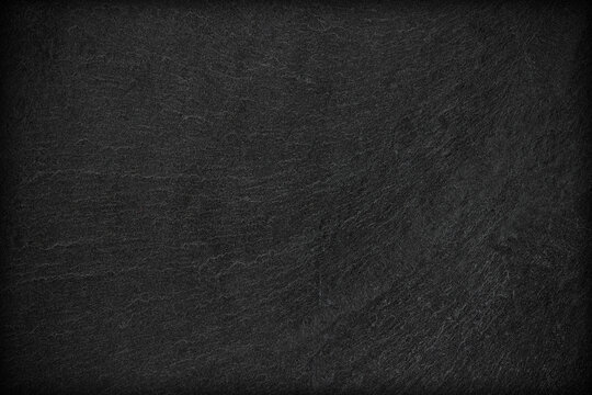 Dark grey black slate background or texture.