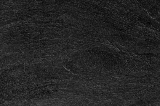 Dark grey black slate background or texture.