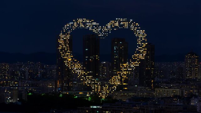 A spectacular timelapse of city building lights forming a giant heart shape against the night skyline, concept of public declaration and urban romance