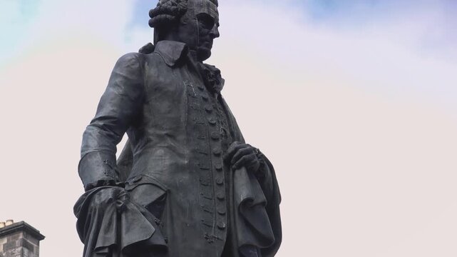 The statue of Adam Smith is a large bronze monument in Edinburgh, Scotland.