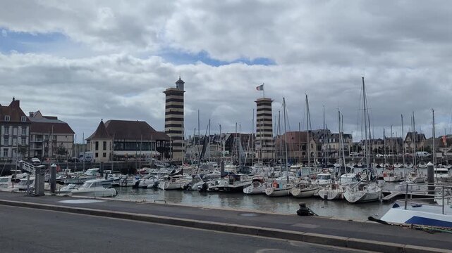 Harbor Views. A bustling marina filled with boats. The clouds linger above, creating a stunning atmosphere. Explore the marine life and vibrant scenery.
