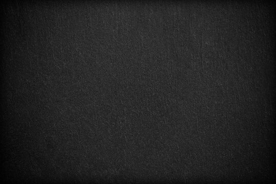 Dark grey black slate background or texture.