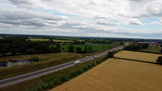 Aerial footage raises up over a dual carriage on the outskirts of Norwich.