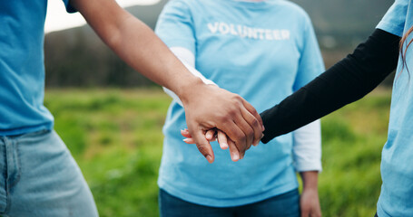 Volunteer, people or hands together in nature with support for environmental outreach, charity or NGO. Team, huddle or collaboration for eco friendly project, social responsibility or sustainability.