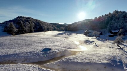 appalachia in snow and winter aerial scene near boone nc, north carolina