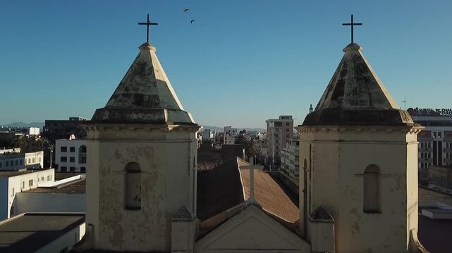 Drone-style footage of an old historic church in Al Hoceima, showcasing its aged architecture and cultural heritage in northern Morocco.