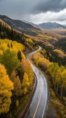 Winding Road through Autumnal Splendor: An aerial view of a serpentine road weaves through a landscape ablaze with the vibrant hues of autumn, capturing the beauty of nature