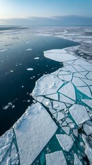 Arctic Ice Panorama: A breathtaking view showcasing a vast expanse of icy terrain, where crystalline ice formations meet the tranquil sea in a display of nature's raw beauty. 