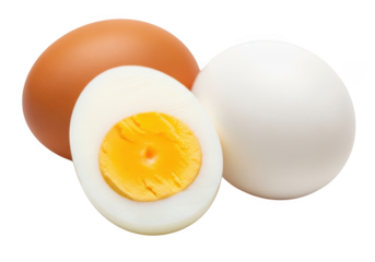 Two whole eggs and one half of a hardboiled egg isolated on transparent background