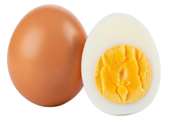A whole brown egg and a halved hardboiled egg showing its yolk, isolated on transparent background