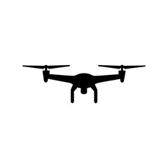 Silhouette of a quadcopter drone, a flying machine for aerial photography and filming