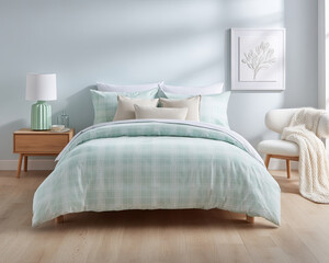 bright, clean bedding set perfectly centered on bed, featuring soft mint green plaid design. room exudes fresh and cozy vibe, ideal for restful sleep