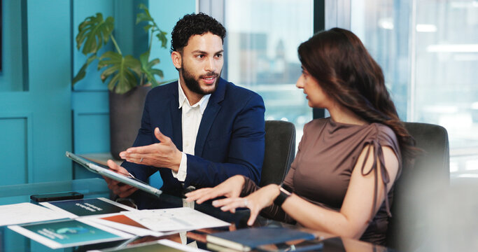 Paperwork, discussion and tablet with business people in office together for risk management. App, budget and collaboration with man and woman in financial workplace with charts, graphs or review - Powered by Adobe