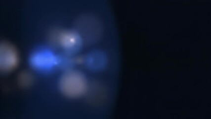 A deep navy blue abstract gradient background with soft bokeh light effects and subtle lens flare. Dark moody atmosphere. - Powered by Adobe