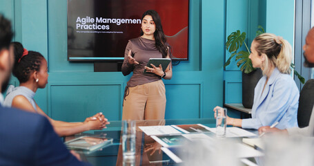 Woman, presentation and business people in meeting on tablet for agile management practices in...