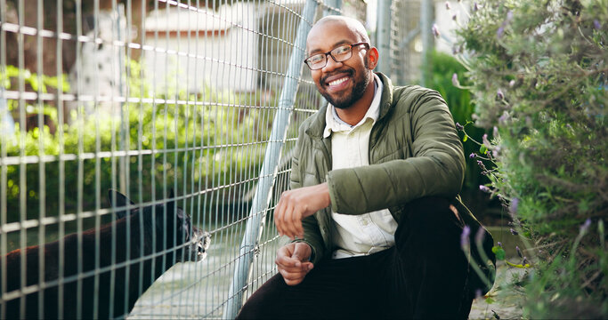 Portrait, man and dog at shelter for animal adoption with happiness, kindness and companion search. Weekend, black person and puppy at pet rescue for volunteer service, ngo support and canine foster.
