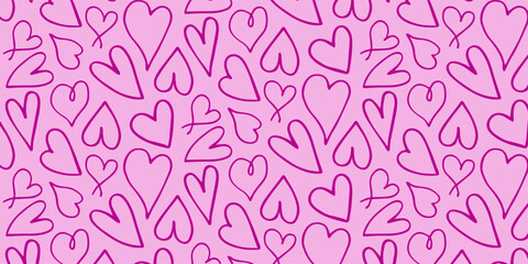 A pattern of pink hearts on a light pink background. Seamless texture for textiles, wrapping paper, Valentine's Day, or romantic designs. Artistic doodle wallpaper.