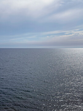 Ocean twinkling water beautiful sky horizon vertical.