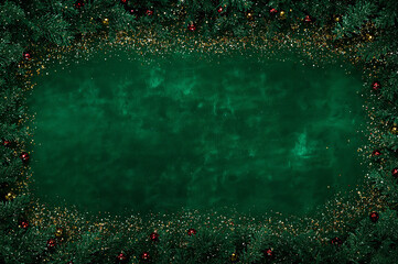 A rich green textured backdrop framed by golden glitter, evergreen boughs, and festive ornaments. Perfect for elegant seasonal designs. copy space