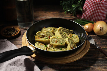 Traditional German Swabian dish maultaschen cut and fried with onion	