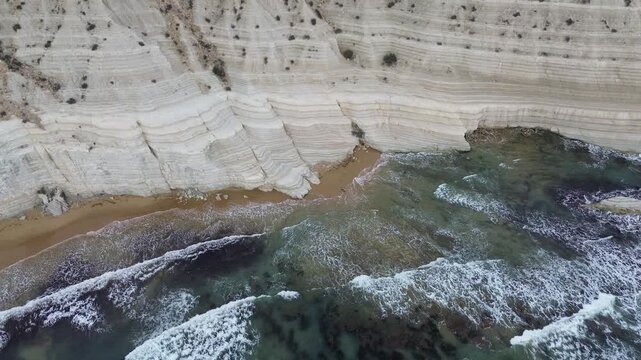 sea water flowing scala dei turchi Beautiful white beach from above drone shot pretty blue ocean sea