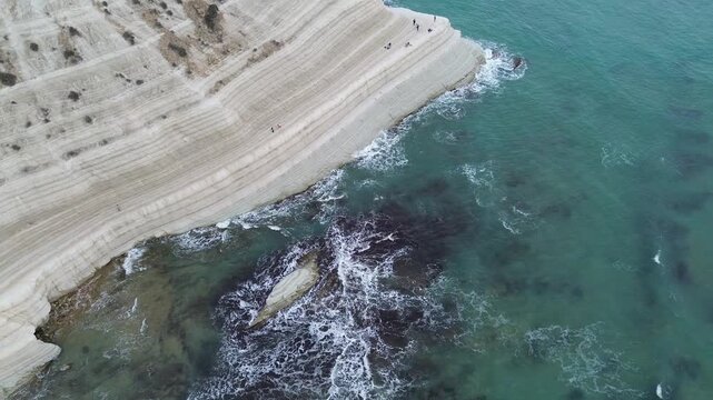 sea water flowing scala dei turchi Beautiful white beach from above drone shot pretty blue ocean sea