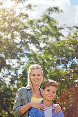 Fototapeta premium Portrait, mother or child in forest with smile, connection or bonding together on summer break. Happy, space or people in nature with trust, parent love or healthy relationship in spring getaway.