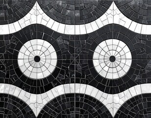 Black and white mosaic tile design featuring circular and wavy patterns