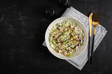 Avocado ricotta salad appetizer with soy sauce. Healthy food. Top view.